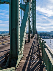 Shadows on the walkway of the Yaquina Bay Bridge in Newport, Oregon, USA