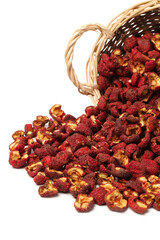 Dried chinese hawthorn fruit isolated over white background. Used in traditional herbal medicine. Crataegus.