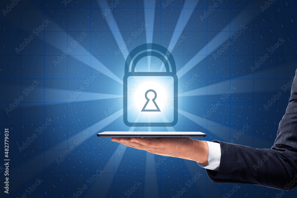 Poster close up of businessman hand holding tablet with glowing padlock on coding background. digital safet