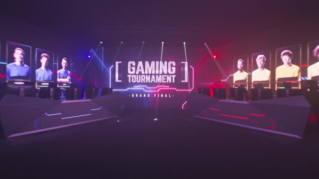 Zoom in large LED monitor with Gaming Tournament Grand Final inscription illuminated with red and blue neon lights in empty room with desks and computers