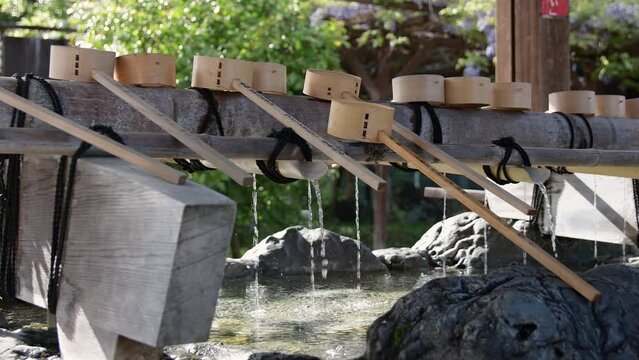 Temizuya - Water filled basin used by Shinto worshipers in Japan for ceremonial purification.