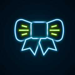 Glowing neon line Gift bow icon isolated on black background. Colorful outline concept. Vector