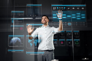 business, augmented reality and technology concept - happy smiling businessman working and touching...