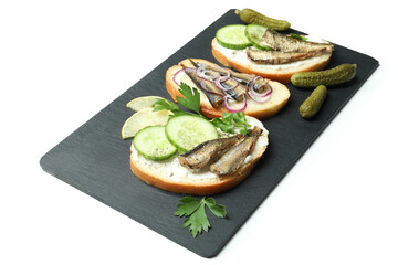 Tray with sandwiches with sprats isolated on white background