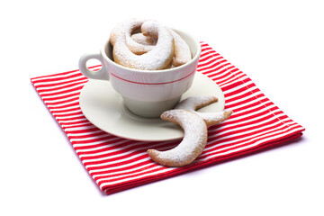 Traditional German or Austrian Vanillekipferl vanilla kipferl cookies in coffee cup