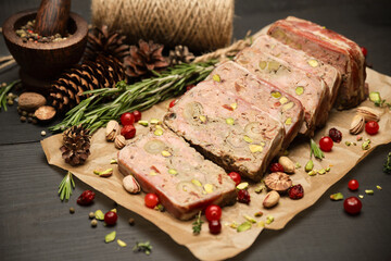 Sliced Traditional French terrine covered with bacon on dark wooden background - obrazy, fototapety, plakaty