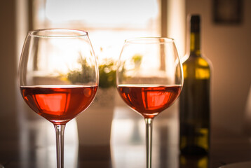 two glass of wine on the table 