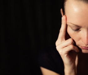 portrait of a woman in deep thought and concentration,  mind health concept. 