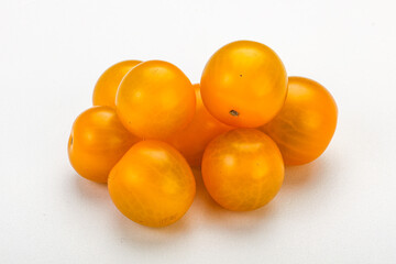 Fresh yellow cherry tomato heap