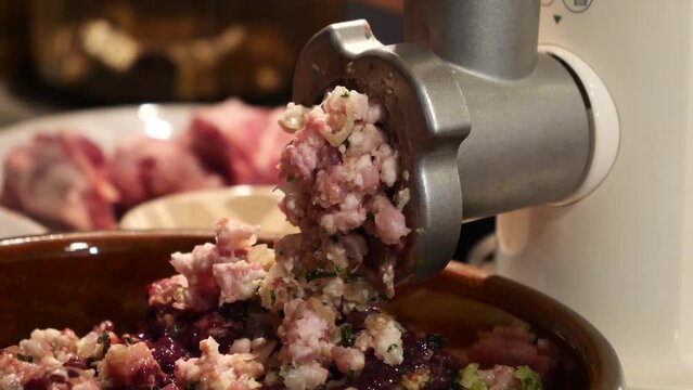 process of preparing forcemeat by means of a meat grinder