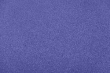 Texture of satin fabric in the color of the year 2022 very peri, top view