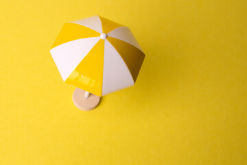 colorful beach umbrella on green background