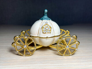Decorative golden pumpkin carriage from Cinderella close-up