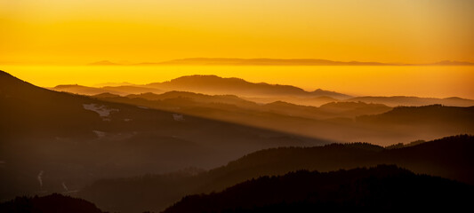 Beautiful landscape panorama in the Black Forest - View during the sunset in the mountains,hills,...