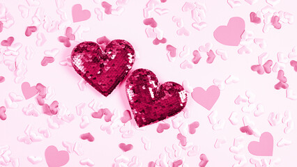 Abstract two pink Rose hearts on Rose background with small hearts. Concept love, Valentine's Day greeting card. Festive background. Holiday frame.