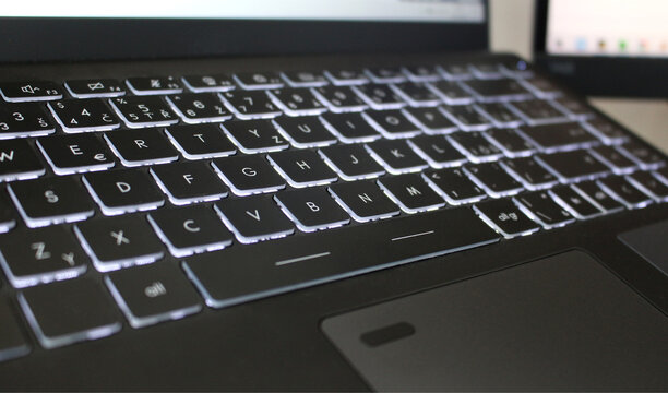 Cool black laptop keyboard with backlit buttons
