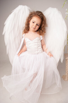 beautiful very cute girl angel angel on valentine's day in an airy dress is caught on camera