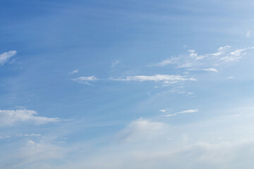 Light white clouds in the blue sky