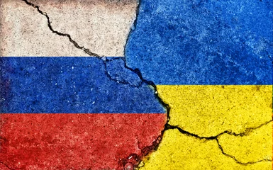 Fotobehang Russia vs Ukraine (War crisis , Political  conflict). Grunge country flag illustration (cracked concrete background) . © barks