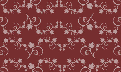 maroon background with bunch of gray leaves