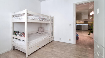 bunk bed in a bright children's room. 