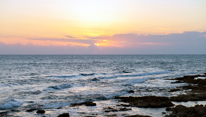 Fototapeta na wymiar Winter sunset in Cyprus on the coast of Paphos 