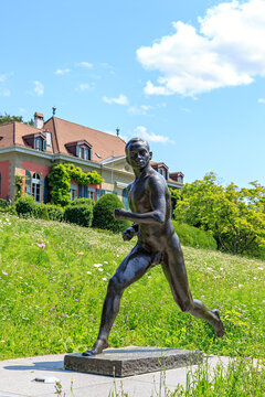 Lausanne, Switzerland - July 13, 2019: Sculpture of Paavo Nurmi in the park of the Olympic Museum in Lausanne. Sculptor Vaino Aaltonen