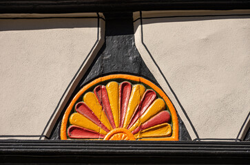 Fan Rosettes On Historical Half-Timbered Architecture