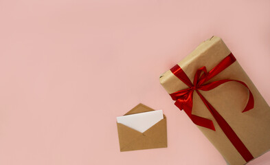 Valentine day love letter mockup blank flat lay top view with copy space gift on pink background