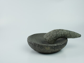 Fototapeta na wymiar Indonesian traditional mortar and pestle isolated on a white background