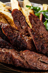cut Lulia kebab with potato