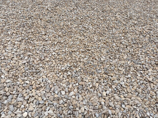 Texture of small pebbles of crushed stone