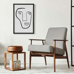 Stylish scandinavian composition of living room with design armchair, black mock up poster frame,...