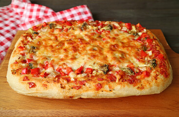 Fresh Baked Homemade Pizza Alla Pala on Kitchen Table