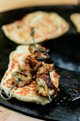 Grilled chicken shish tavuk and naan.selective focus