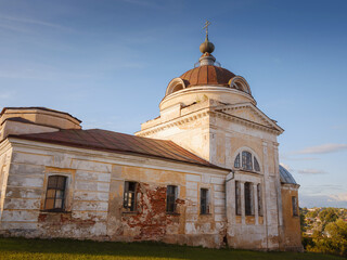 Fototapeta na wymiar summer travel to Russia, Torzhok city. Novotorzhsky Borisoglebsky Monastery. Architectural monument on high bank of Tvertsa River. one of oldest Russian Orthodox monasteries