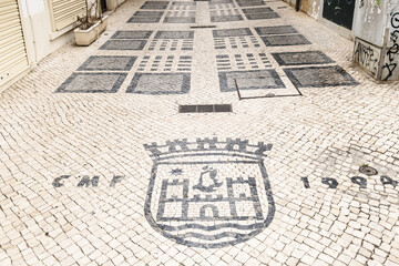 Traditional style Portuguese Calcada Pavement for pedestrian area in Faro, Algarve, Portugal	
