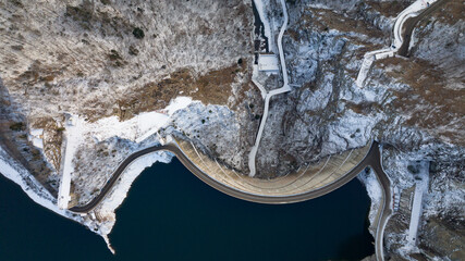 Aerial view of a dam on a cloudy day