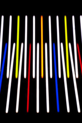 Abstract multicolored glowing abstract stripes on isolated black background. Design for background, banner, presentation template.