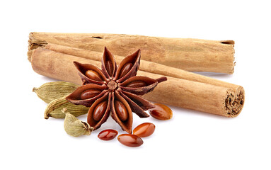 Cinnamon, cardamomm and anise  isolated on white background. Spices closeup.