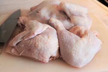 Fototapeta na wymiar Raw chicken meat on the kitchen table. Healthy food.