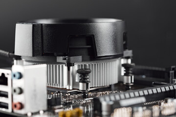 Computer Motherboard and graphics cards, bitcoin mining and cryptocurrency. Close-up on several GPU. Bitcoin Cryptocurrency coin on a PC computer motherboard, crypto currency mining concept.