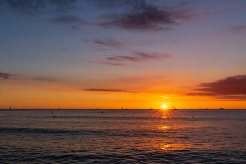 waikiki hawaii sunset over the sea