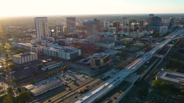 Drone parallax video over I-4 in downtown Orlando, FL during sunrise.