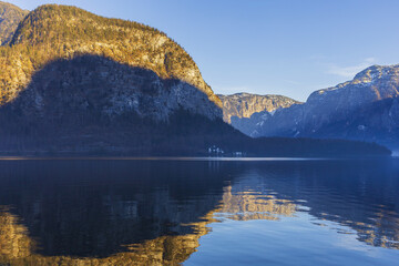 Alpine mountain lake on winter sunset
