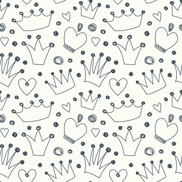 Seamless pattern with crowns. Drawn with doodles in a children's style. Monochrome background.