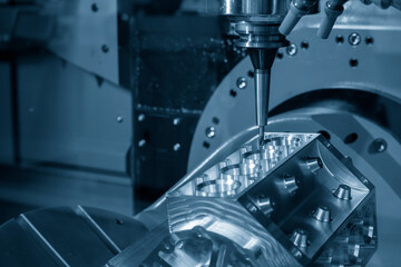 The  5-axis machining center cutting the v8-engine cylinder block by solid ball endmill tool.