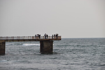 Fototapeta na wymiar beach front bridge for tourism 