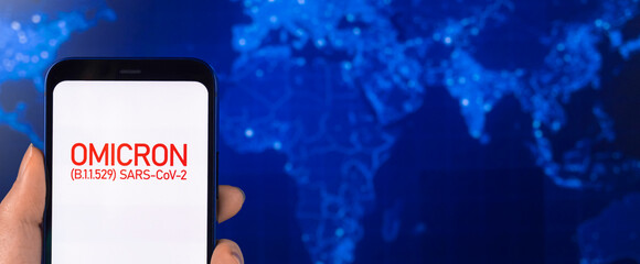Banner, Omicron variant of COVID-19, mutation spread on world wide map background. Vaccination...