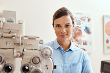 I'm keeping my eyes on yours. Portrait of a confident woman using an optical refractor in an...
